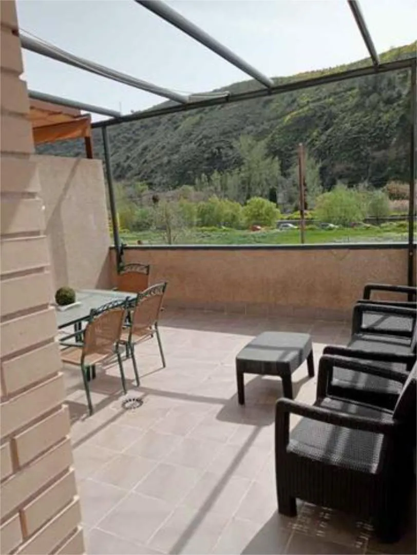 Casa adosada en Genil - Foto 1