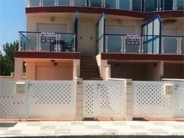 Casa adosada en Playa de Oliva - Foto 1