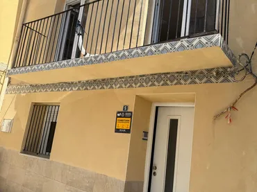 Casa adosada en  Carrer de la Muralla 5 - Foto 1
